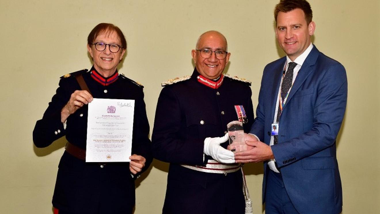 The Lord-Lieutenant presenting an award for voluntary service