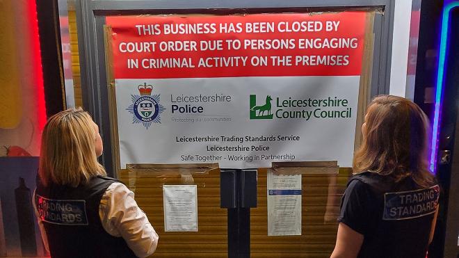 Trading Standards officers with closure notice